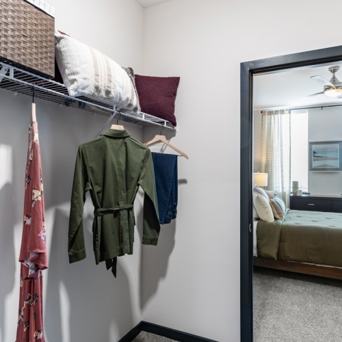 large walk in closet with racks for storage