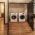 laundry closet with side-by-side washer and dryer